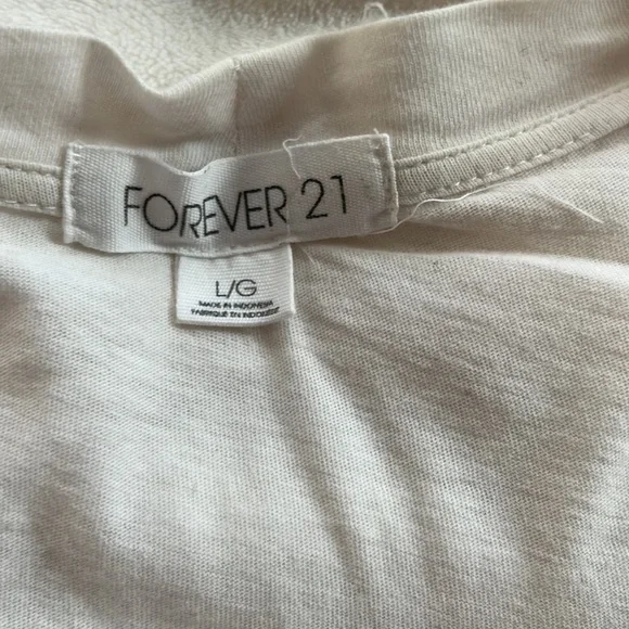 Forever 21
Color: Cream
Type: Cardigan 
Size: Large - Picture 2 of 3